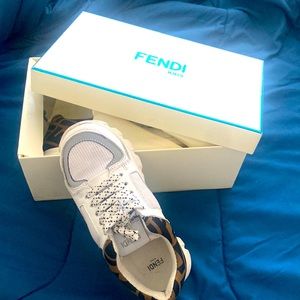 I’m selling a slightly worn kids fendi sneaker with box and duster